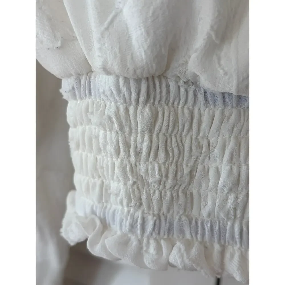 By Anthropologie Milena Burnout Velvet Wrap Blouse white ruffle cottagecore